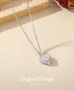 Detail of S925 silver heart necklace featuring a 1 carat moissanite gemstone