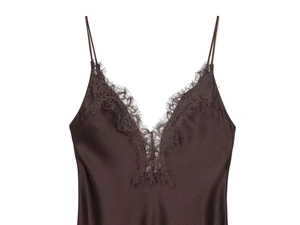 Detail of V-neck lace trim and chocolate brown satin fabric on camisole dress