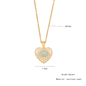 Detail of gold heart pendant with blue evil eye enamel and chain length specifications