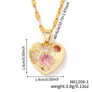 Detailed view of gold heart pendant with pink stones and size measurements in inches