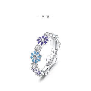 925 sterling silver ring with blue and purple enamel flowers and sparkling zircons