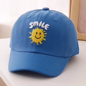 Detailed close-up of kids' blue cotton baseball cap with Smile sun 3D embroidery