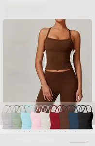 Detailed view of criss-cross back straps and wide color range of the yoga tank top