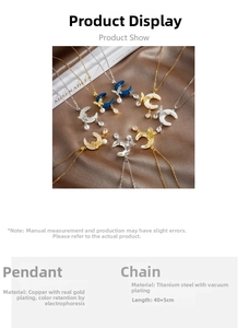 Detailed view of titanium steel necklace with butterfly moon pendant and pearl drop charms