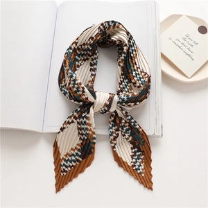 Classic houndstooth pleated square scarf in brown, green, and white for versatile styling