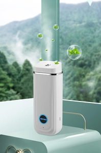 Wall-mounted smart aroma diffuser with white minimalist design and AROMA logo detail