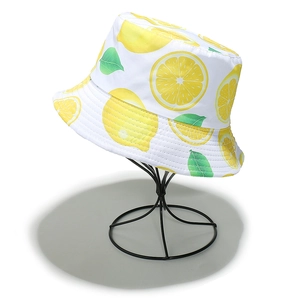 Detailed close-up of summer sun bucket hat featuring vibrant lemon fruit pattern print