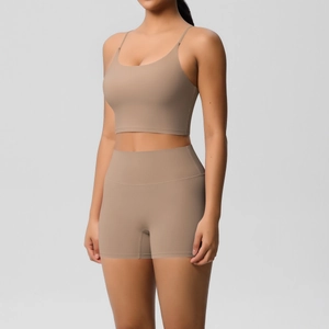 Detail of coffee-colored brushed yoga set showing U-neck sports bra and high-waist shorts