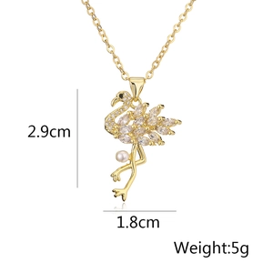 Detail showing dimensions of golden flamingo pendant necklace with colorful zircon and pearl