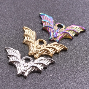 Set of punk style stainless steel bat pendants in silver, gold and rainbow finishes