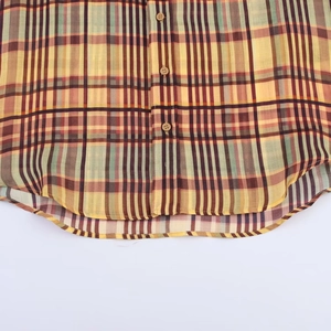 Chemise à carreaux en lin jaune et vert avec ourlet arrondi et boutons classiques