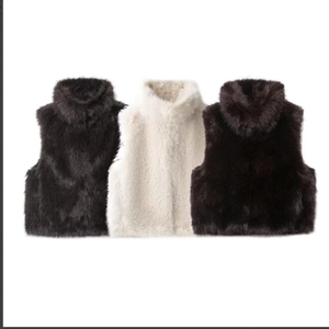 Short high-neck faux fur vest in black, cream, and coffee colors with rich texture