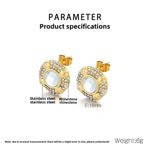 Macro detail of 16mm oval stainless steel earrings with 18k gold plating and rhinestones