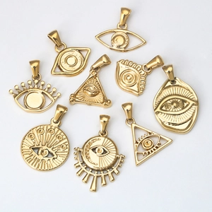 Nine diverse golden evil eye charms in stainless steel for DIY jewelry making
