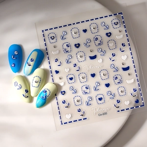 Blue tulip and heart nail art stickers with rhinestones and floral embossed design