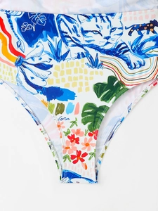 Detail view of floral and cat print bikini bottoms with high-quality stitching and vibrant colors