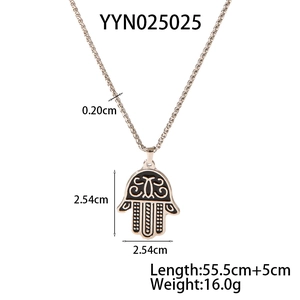 Hamsa hand necklace with black enamel inlay and detailed sizing measurements in the frame