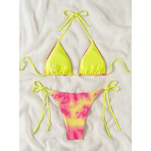 Detailed flat lay of fluorescent yellow bikini with pink marble tie-dye pattern prints