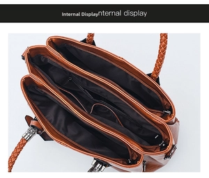 Detail view of the brown oil wax leather Boston bag showing spacious three-compartment interior