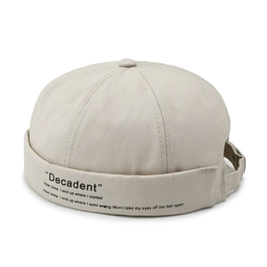 Retro beige cotton docker cap with black letter embroidery and adjustable back strap