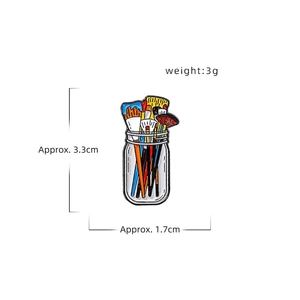 Artistic enamel pin featuring colorful paintbrushes in a jar, zinc alloy creative brooch