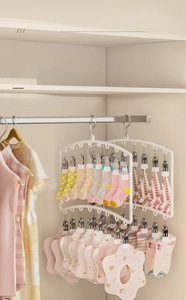 Multi-clip baby hanger for drying socks and bibs in a closet storage setting