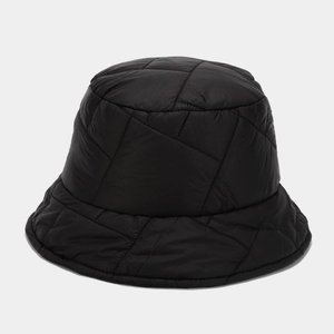 Close-up of black quilted puffer bucket hat with geometric stitching and warm padding