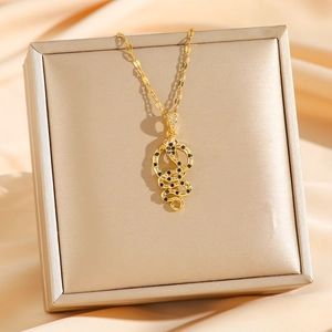 Snake pendant necklace with black cubic zirconia and red eyes on gold chain