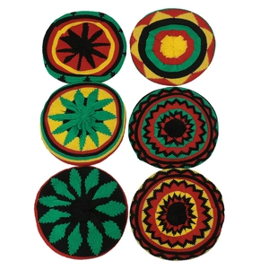 Set of six handmade crochet Rastafarian beanies with classic red green and yellow colors
