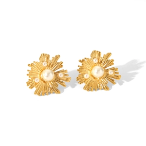 Golden sunburst pearl earrings with textured flower design and irregular metal details