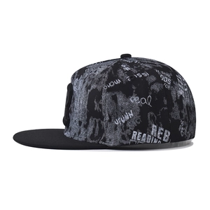 Graffiti printed snapback baseball cap in black and grey with flat brim street style