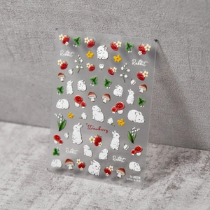 Autocollants à ongles 5D en relief avec d'adorables lapins blancs et motifs de fraises