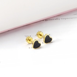 Minimalist gold heart stud earrings with black inlay and secure screw-back closures
