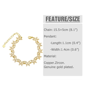 Detailed view of zircon-studded butterfly links and adjustable lobster clasp on gold bracelet