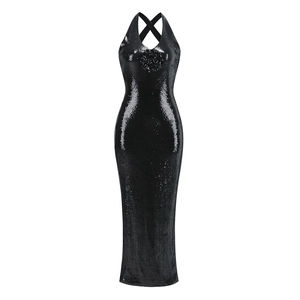 Close-up of black sequined evening gown with halter neck and handmade floral detail
