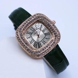 Elegant rose gold square watch with crystal bezel and green crocodile leather strap