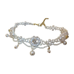 Elegant floral faux pearl necklace with sparkling crystals and gold clasp for women
