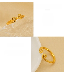 Detailed views of gold-plated stainless steel ring with ornate cloud patterns