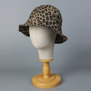 Fashionable leopard print bucket hat with a rounded crown for sun protection and style