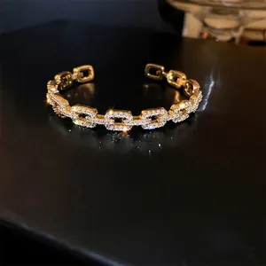 Gold-plated link chain open bangle with sparkling pave-set cubic zirconia stones