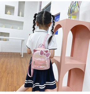 Pink glitter cat ear backpack with sequin bow and clear front pocket detail