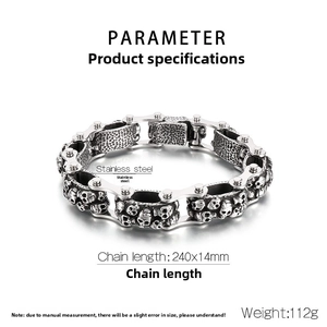 Detail view of punk skull link chain bracelet in stainless steel showing size and weight