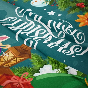 Close-up of flannel Christmas tapestry fabric showing Merry Christmas print and soft texture