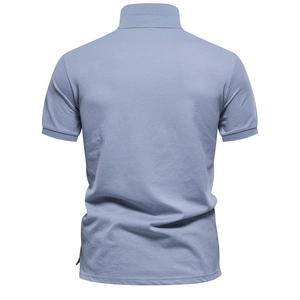 Rear view of khaki blue gradient polo shirt with cotton fabric and flat lay design