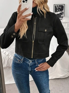 Detailed close-up of a black faux suede jacket featuring gold zipper and cargo pockets