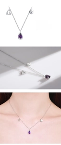 Macro view of S925 silver Libra necklace with purple teardrop gemstone and constellation charms