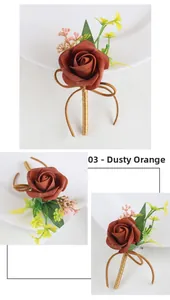 Detailed view of the burnt orange artificial rose boutonniere with vintage leaf accents
