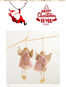 Detail of pink plush angel Christmas ornaments with golden wings and wooden beads
