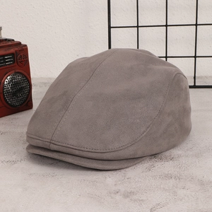 Detailed close-up of grey vintage suede newsboy cap showing fine stitching and soft texture