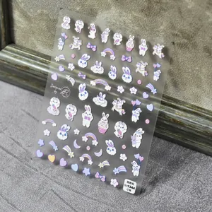 Detail of 5D embossed rabbit nail art stickers with purple hearts and stars